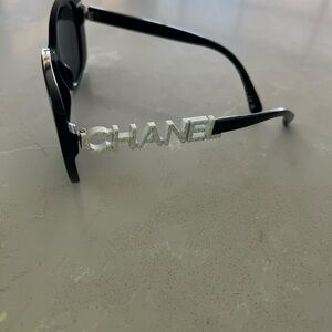 CHANEL Black Sunglasses with Silver Logo